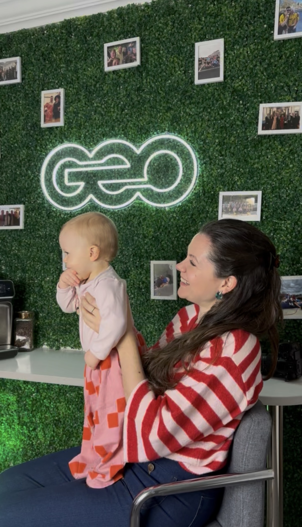 IMG_1832 branding agency team member Caroline with baby in creative office culture space