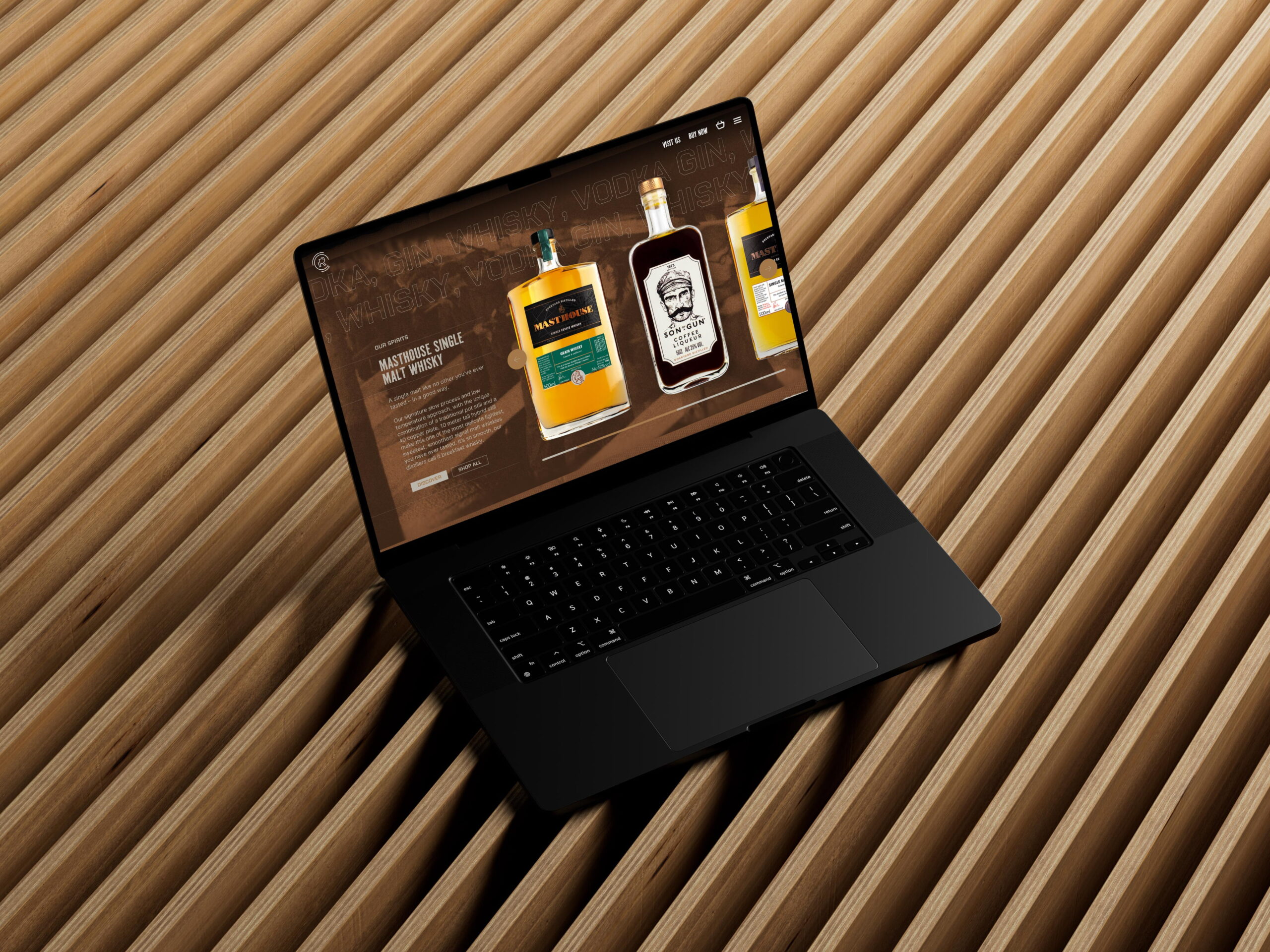 Copper Rivet branded website assets on a laptop Copper Rivet branded website assets displayed on a laptop, showcasing spirits product pages and bottle designs.