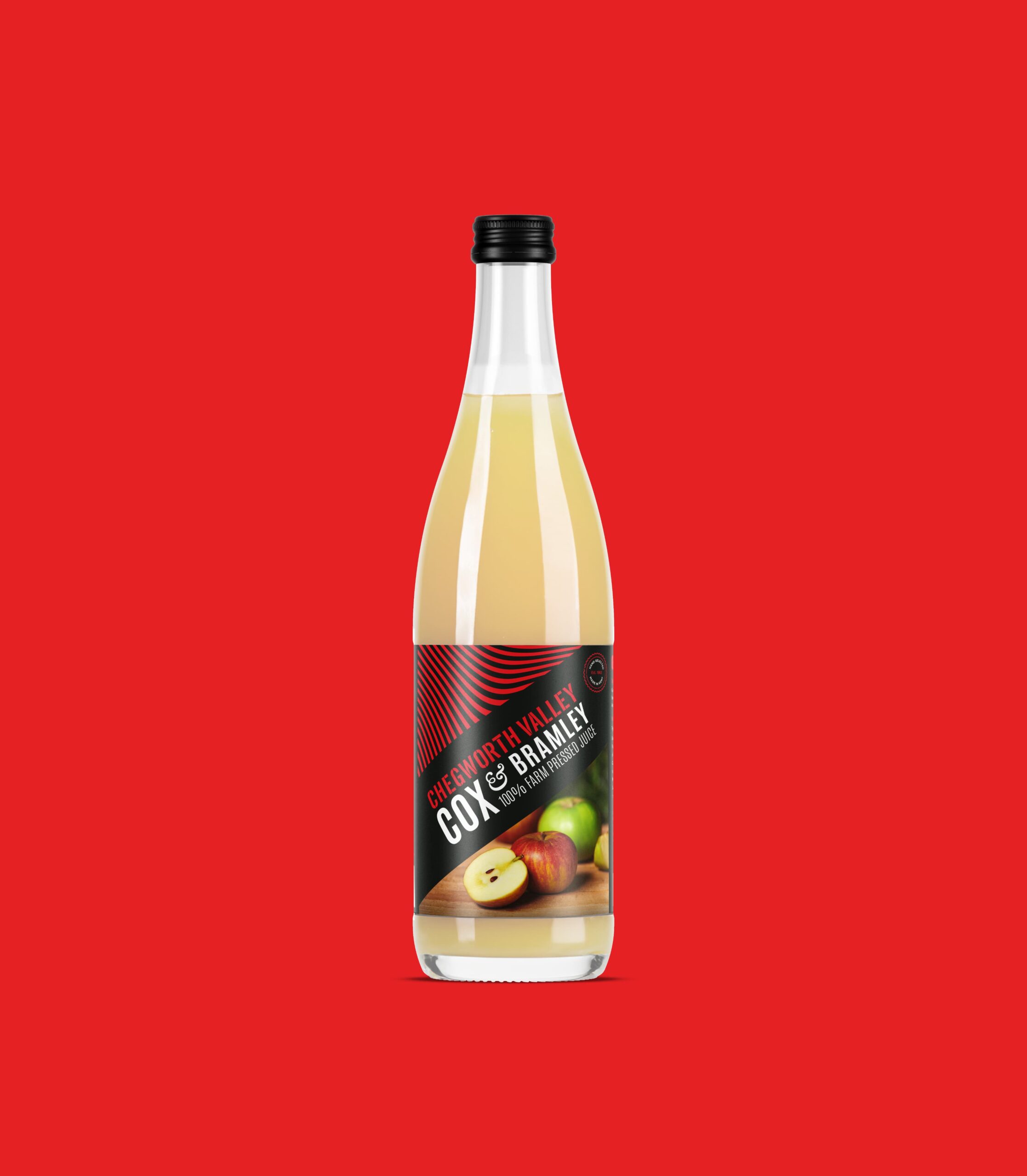 Chegworth Valley Cox & Bramley apple juice bottle, branded glass packaging, farm-pressed English apple juice on red background.