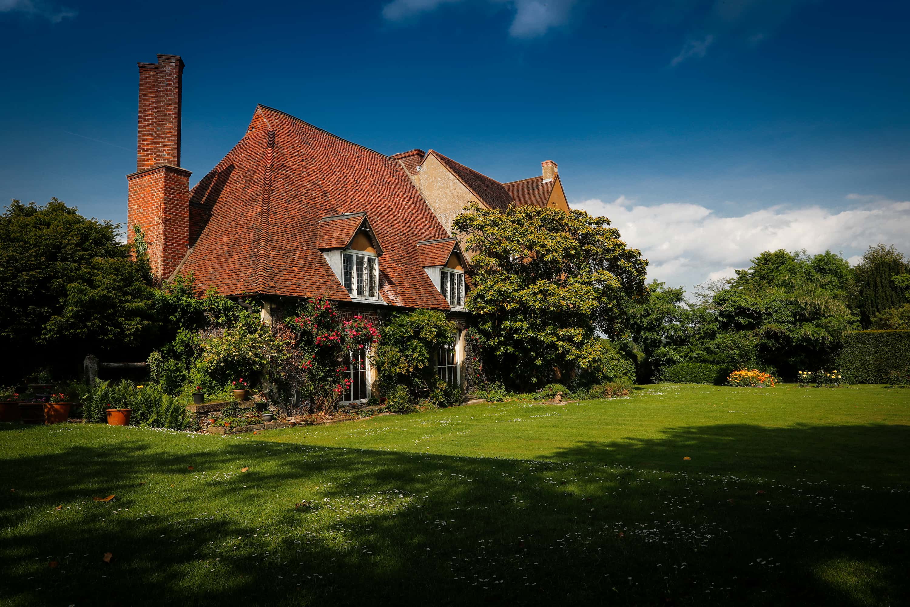 Nurstead Court venue photography showcasing the historic house and gardens captured for luxury hospitality branding and website design